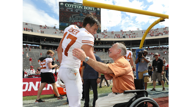 Texas Governor Greg Abbott shakes hands with Cameron Dicker 