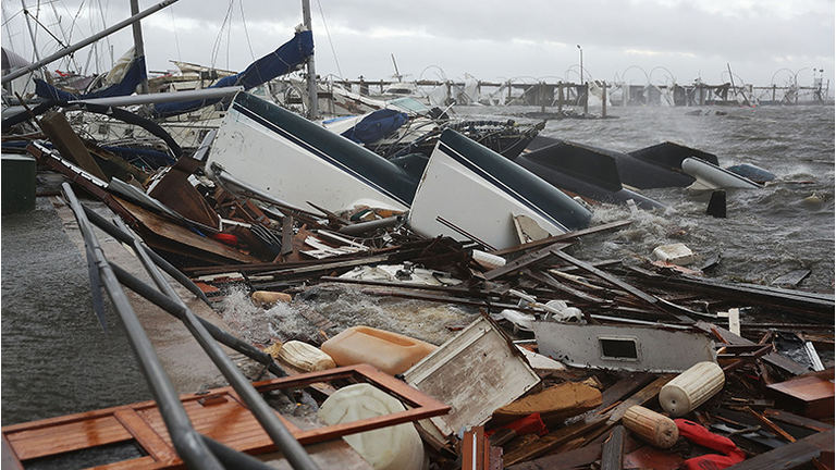 Boats that were docked are seen in a pile of rubble after hurricane Michael passed through the downtown area on October 10, 2018 in Panama City, Florida. The hurricane hit the Florida Panhandle as a category 4 storm