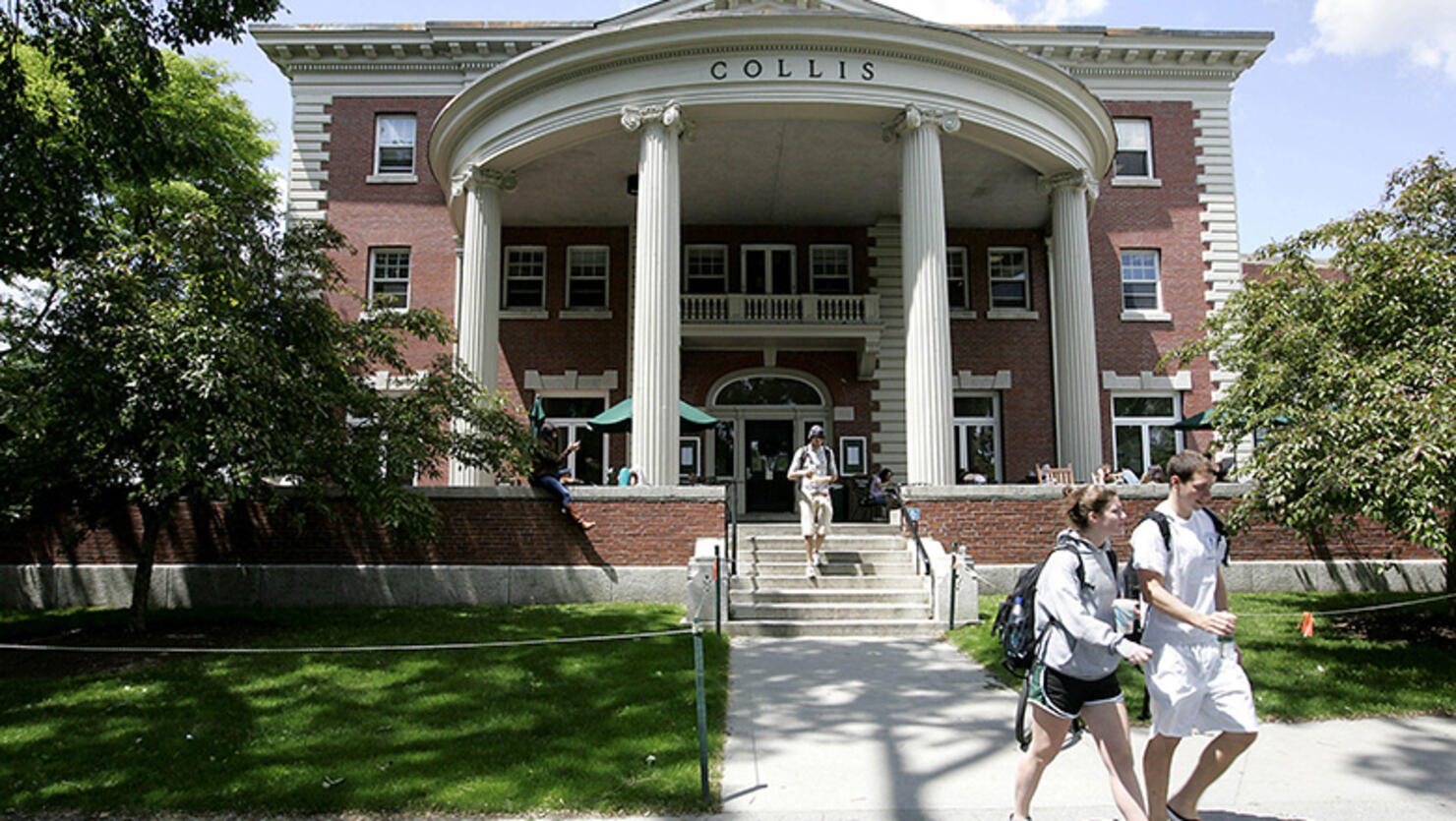 Students walk outside the Collis building on the campus of Dartmouth College, the smallest school in the Ivy League, in Hanover, New Hampshire