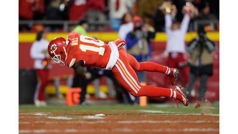 Wide receiver Tyreek Hill #10 of the Kansas City Chiefs dives in to the end zone after a touchdown catch against the Oakland Raiders at Arrowhead Stadium during the second quarter of the game on December 8, 2016 in Kansas City, Missouri. (Photo by Jamie Squire/Getty Images)