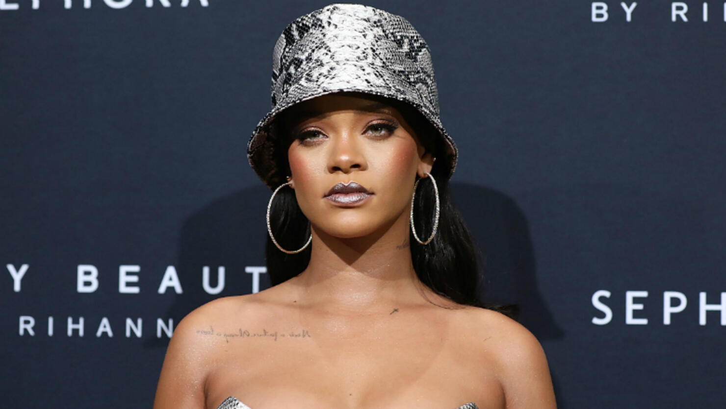 Rihanna Sued By Clothing Company Over Fu Logo Iheart