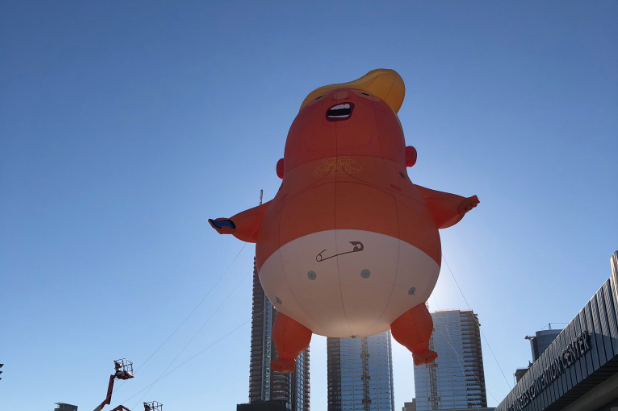 Trump baby balloon takes flight over Politicon
