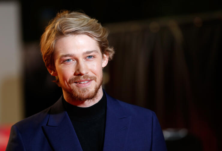 Joe Alwyn Was Asked About Taylor Swift At A Movie Premiere | iHeartRadio