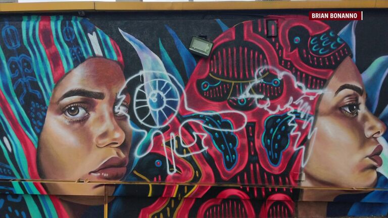 Mural spray painted by vandal WHO TV