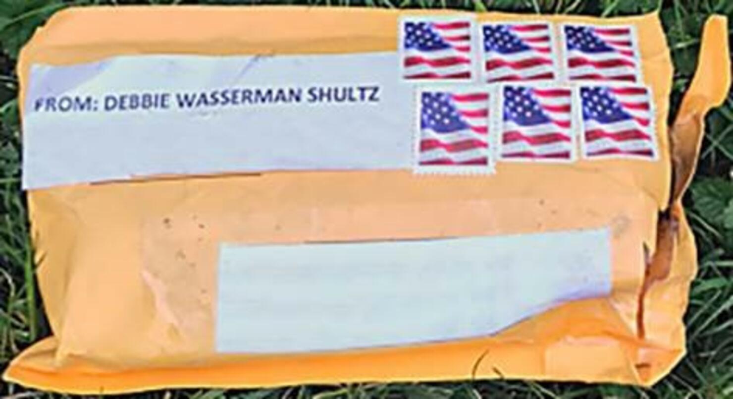 man arrested in connection with suspicious explosive packages