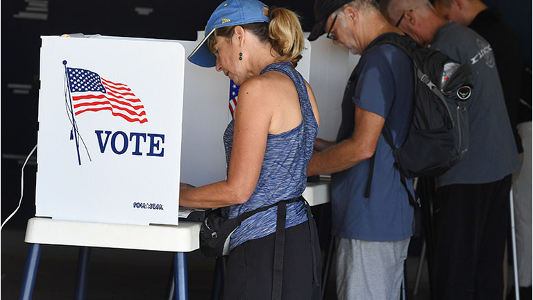 People vote at a Lifeguard headquarters that doubles as a polling station during the midterm elections, in Hermosa Beach, California