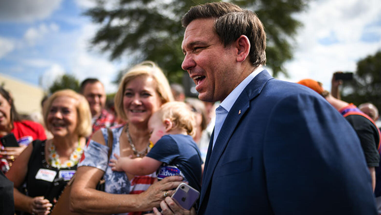 Republican candidate for Governor of Florida Ron DeSantis meets supporters as they attend a rally at Freedom Pharmacy on the final day of campaigning in the midterm elections
