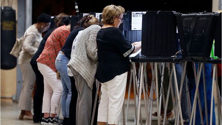 People vote at a polling station in Miami, Florida, on November 6, 2018.