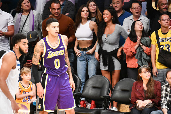 Emily Ratajkowski was spotted at the Laker game. That's her in the white shirt.