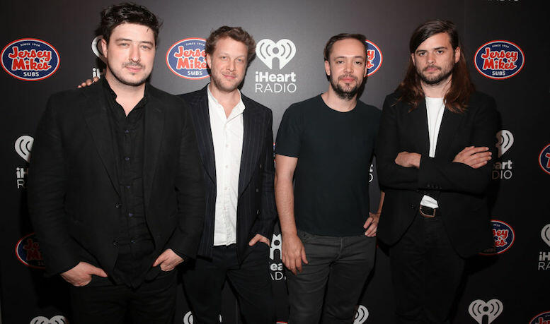 Mumford & Sons Tell A Love Story Through Dance In 'Woman' Video | iHeart