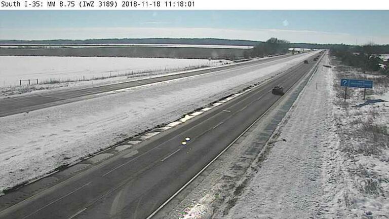 Southern stretch of I-35 gets fresh snow early Sunday.  511ia.org camera 