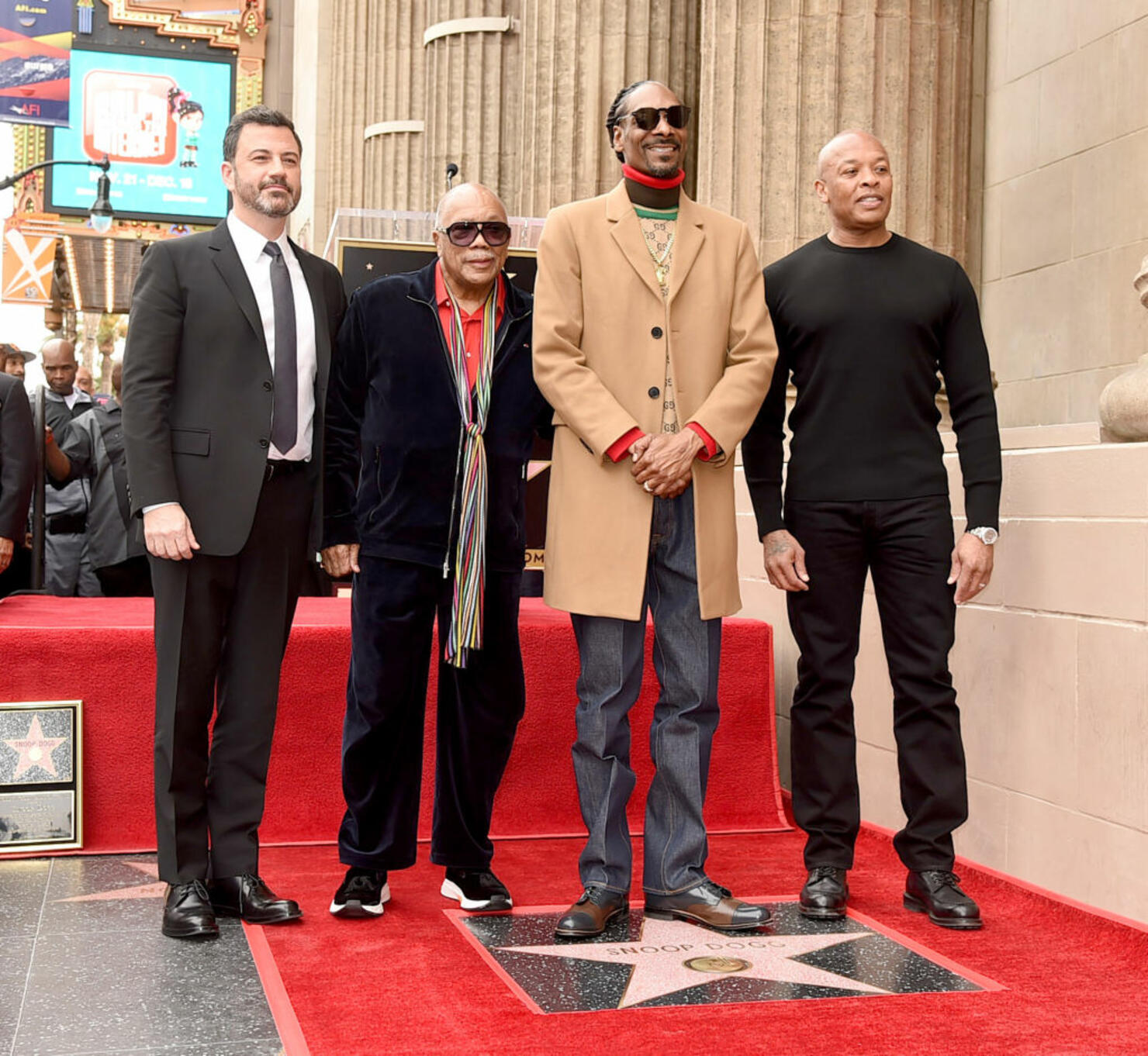 Snoop Dogg, with Jimmy Kimmel (L), Quincy Jones and Dr. Dre (R) is honored with a star on The Hollywood Walk Of Fame on Hollywood Boulevard