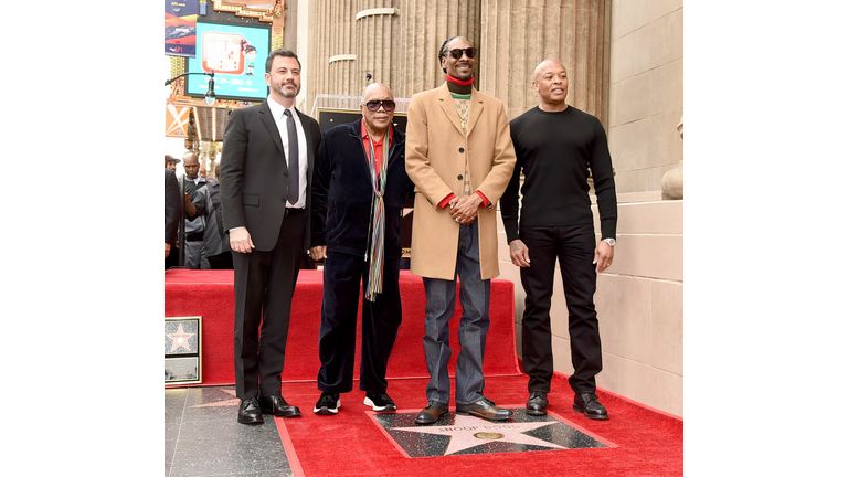 Snoop Dogg, with Jimmy Kimmel (L), Quincy Jones and Dr. Dre (R) is honored with a star on The Hollywood Walk Of Fame on Hollywood Boulevard