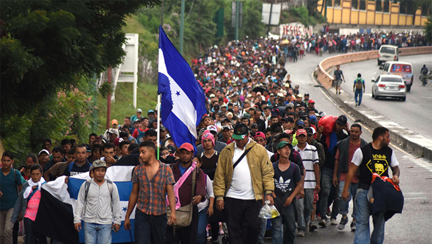 Honduran migrants take part in a caravan towards the United States