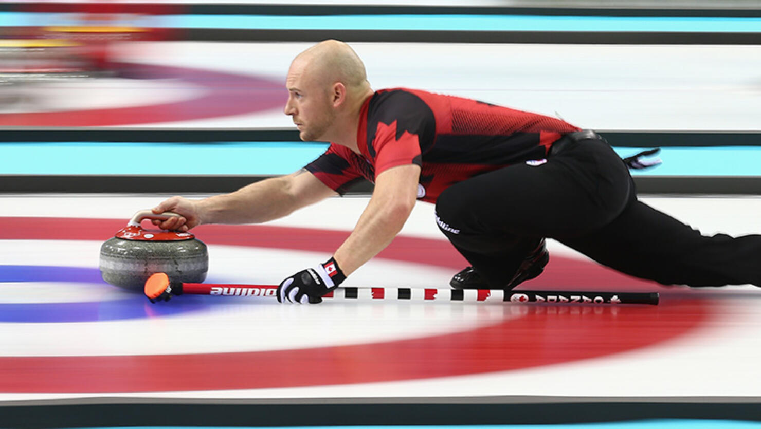 Ryan Fry of Canada in action during the round robin match against Switzerland during day 3 of the Sochi 2014 Winter Olympics