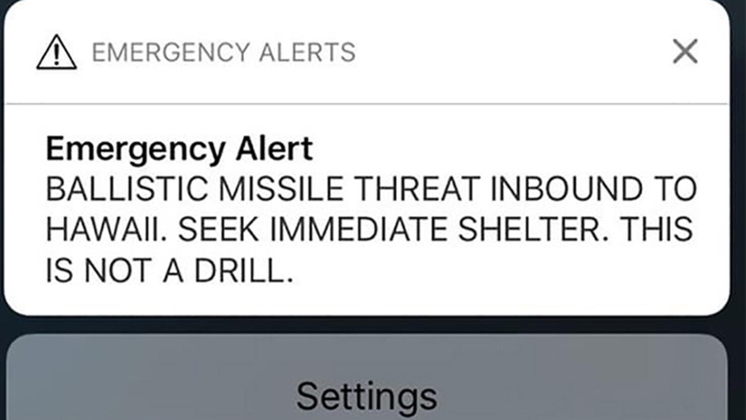A screen shot take by Hawaiian citizen Alison Teal shows the screen of her mobile phone with an alert text message sent to all Hawaiian citizens on January 13, 2018. Hawaii officials swiftly confirmed a cell phone alert warning of an incoming ballistic missile was a 'false alarm' on January 13, 2018