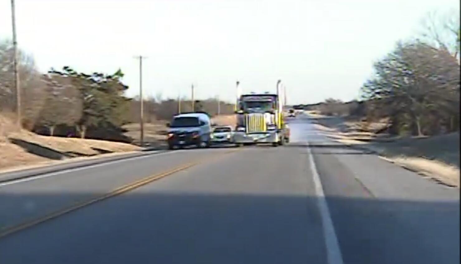 Oklahoma state trooper narrowly avoids head on collision with semi-truck trailer