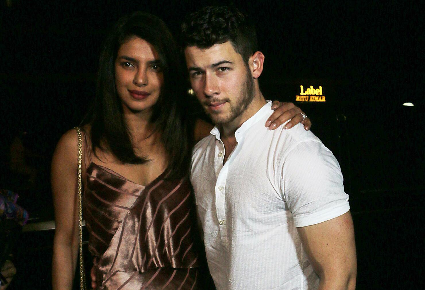 See Priyanka Chopra and Nick Jonas' High-Fashion Family Wedding Photo