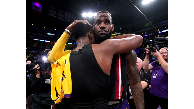 Miami Heat v Los Angeles Lakers LOS ANGELES, CA - DECEMBER 10: LeBron James #23 of the Los Angeles Lakers hugs Dwyane Wade #3 of the Miami Heat, in Wade's last regular season game visit to Staples Center, after a 108-105 Laker win at Staples Center on December 10, 2018 in Los Angeles, California. NOTE TO USER: User expressly acknowledges and agrees that, by downloading and or using this photograph, User is consenting to the terms and conditions of the Getty Images License Agreement. (Photo by Harry How/Getty Images)