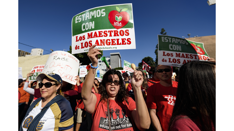 teachers march for pay hikes