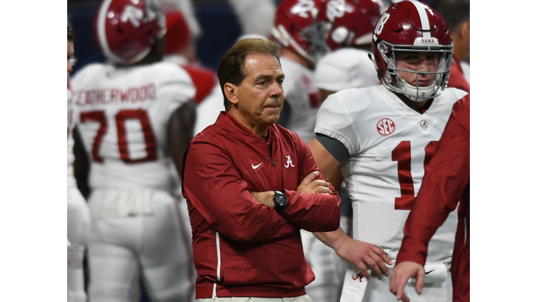 coach suspends three players ahead of orange bowl