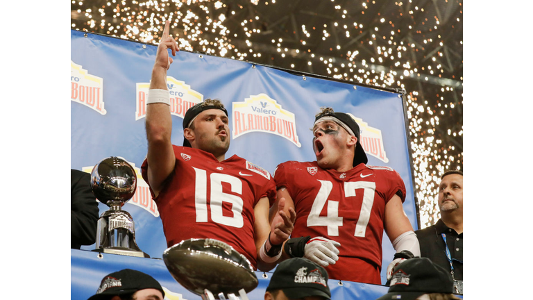 Gardner Minshew and Peyton Pelluer celebrate after the Valero Alamo Bowl