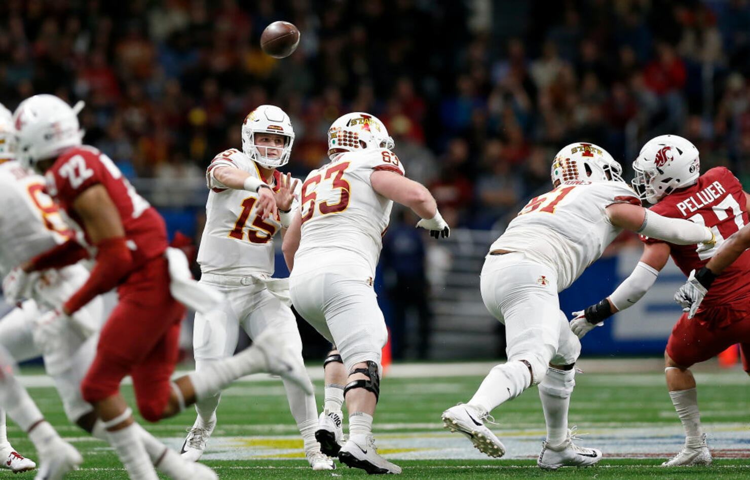 Brock Purdy #15 of the Iowa State Cyclones throws a pass 