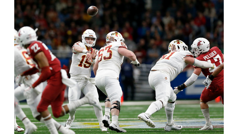 Brock Purdy #15 of the Iowa State Cyclones throws a pass 