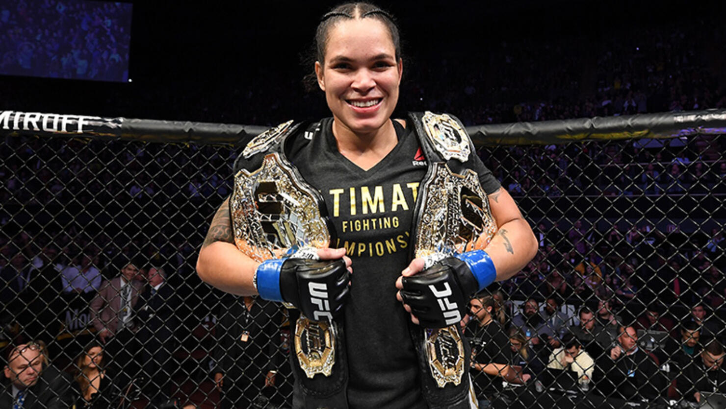 Amanda Nunes of Brazil celebrates her KO victory over Cris Cyborg of Brazil in their women's featherweight bout during the UFC 232 event inside The Forum