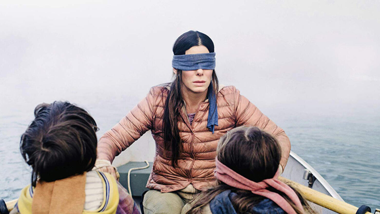 Sandra Bullock, Julian Edwards, and Vivien Lyra Blair in Bird Box (2018) 
