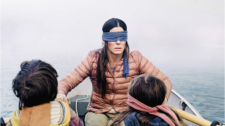 Sandra Bullock, Julian Edwards, and Vivien Lyra Blair in Bird Box (2018) 