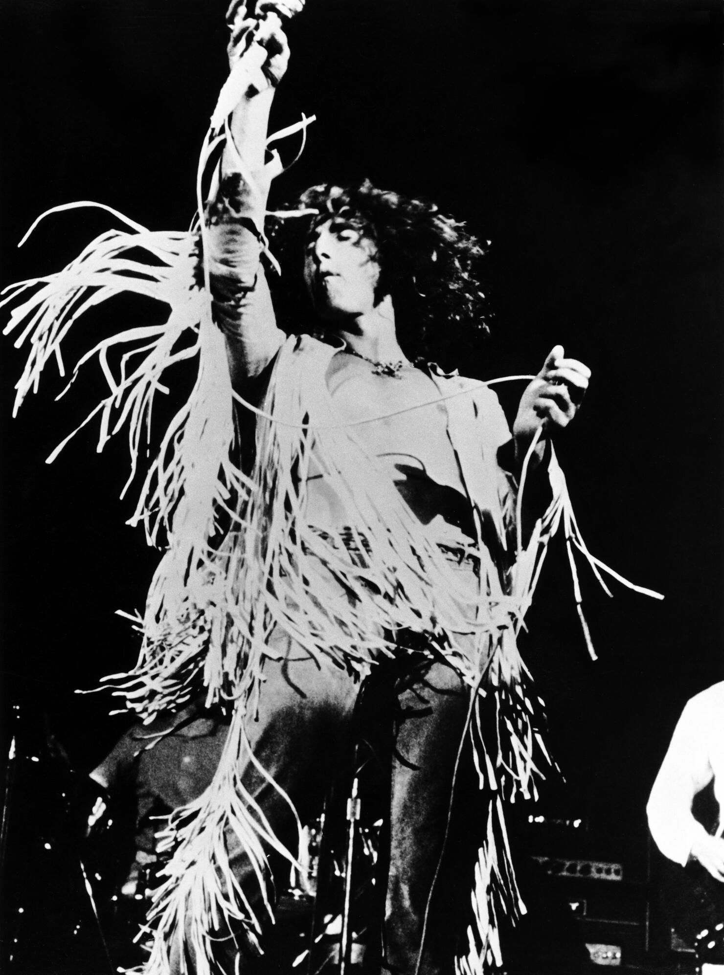 The Who's Roger Daltrey performing at Woodstock in 1969