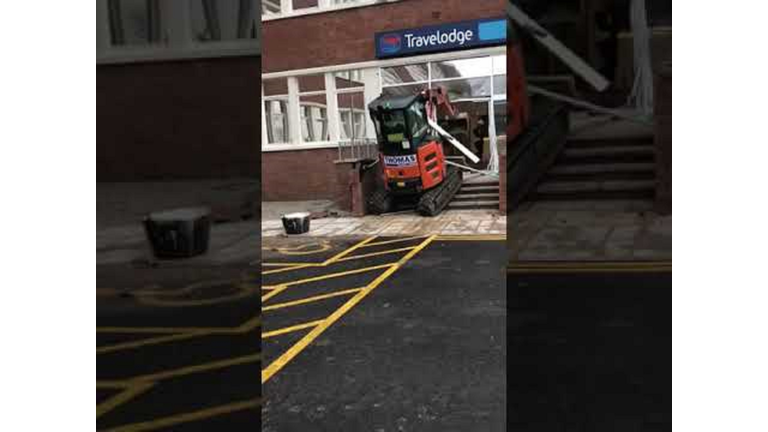 Hunt for digger driver who ploughed 2.5-ton machine into Travelodge in 'row over £600 unpaid bill' then fled - as GoFundMe page to fund 'legend' labourer's legal bill hits £765