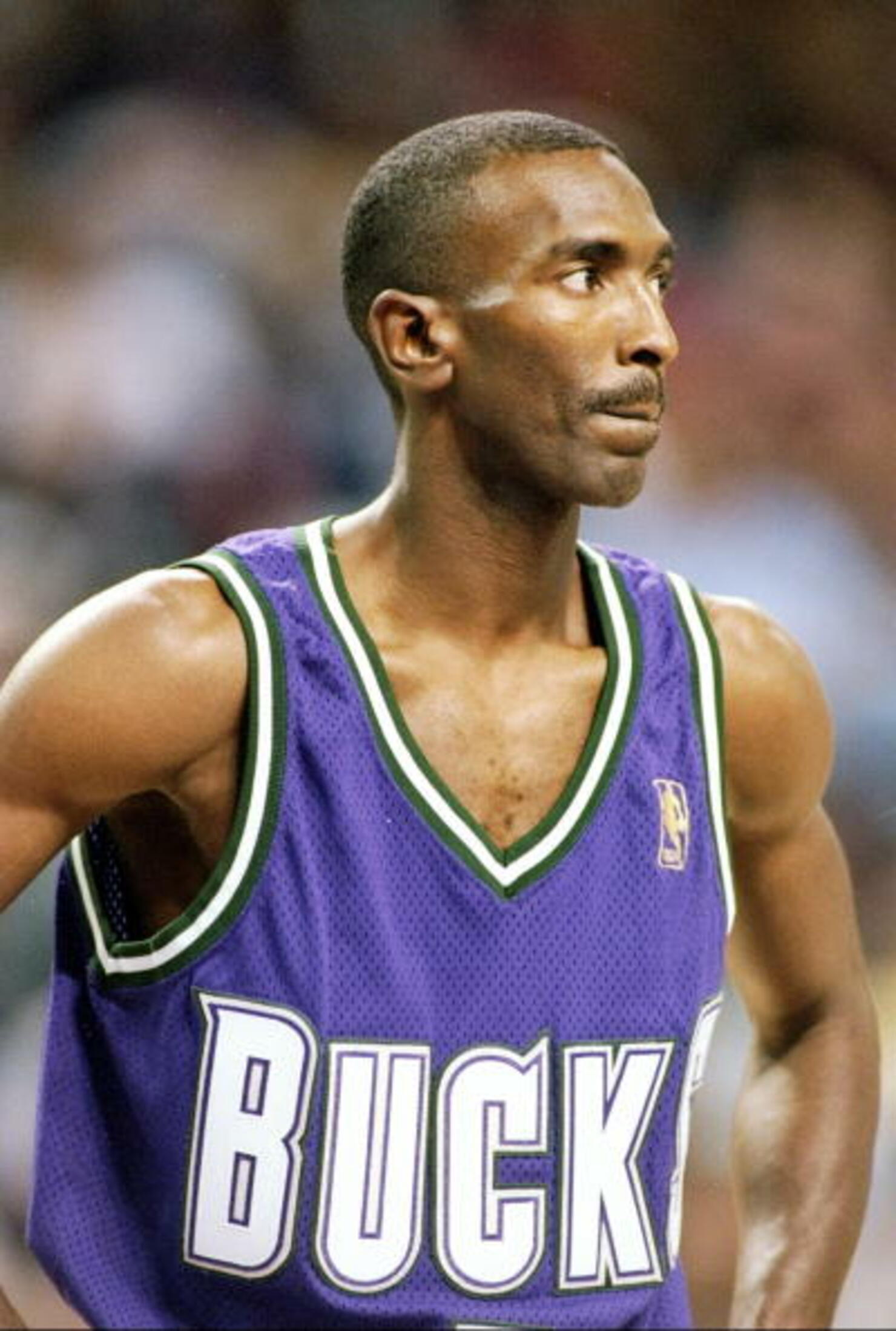 Elliot Perry 15 Nov 1996: Elliot Perry of the Milwaukee Bucks looks on during a game against the Sacramento Kings at the Arco Arena in Sacramento, California. The Kings won the game 103-99. Mandatory Credit: Otto Greule /Allsport