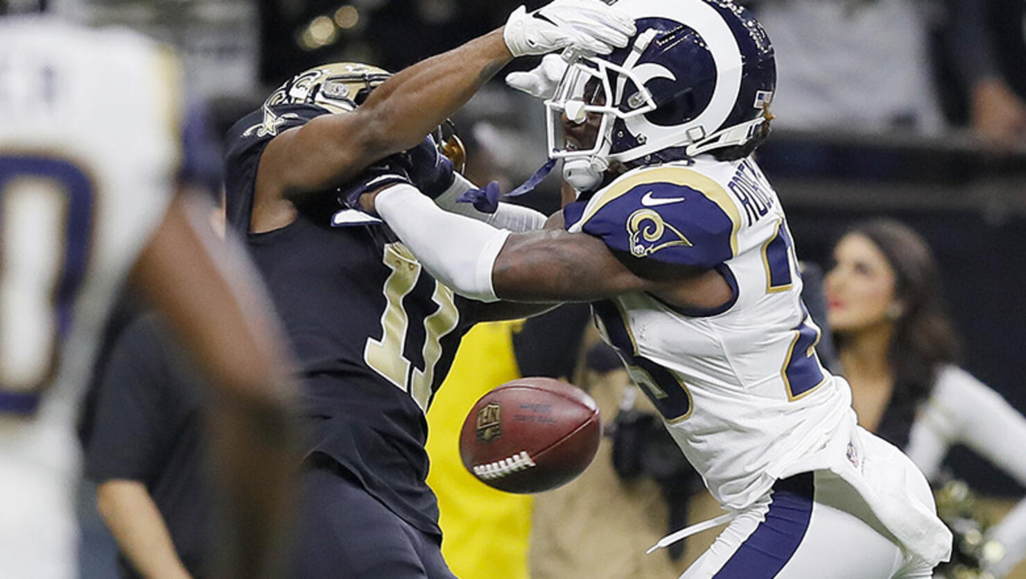 Tommylee Lewis #11 of the New Orleans Saints drops a pass broken up by Nickell Robey-Coleman #23 of the Los Angeles Rams during the fourth quarter in the NFC Championship game at the Mercedes-Benz Superdome on January 20, 2019 in New Orleans, Louisiana