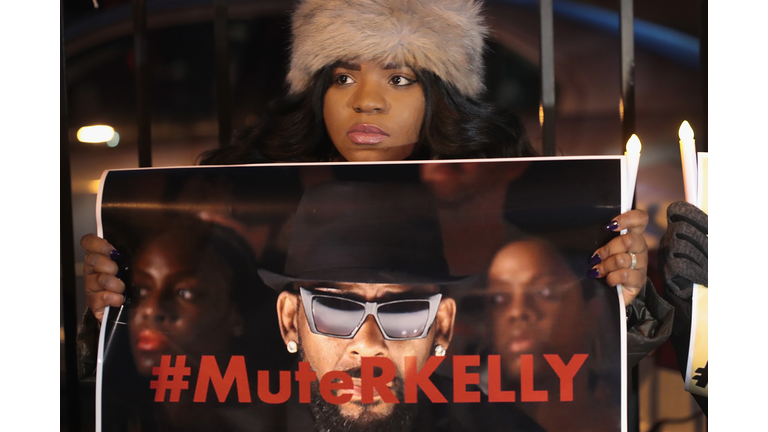 Protestors Rally In Support Of Sex Abuse Survivors At R Kelly's Chicago Studios CHICAGO, ILLINOIS - JANUARY 09: Demonstrators gather near the studio of singer R. Kelly to call for a boycott of his music after allegations of sexual abuse against young girls were raised on the highly-rated Lifetime mini-series 'Surviving R. Kelly' on January 09, 2019 in Chicago, Illinois. Prosecutors in Illinois and Georgia have opened investigations into allegations made against the singer, whose real name is Robert Sylvester Kelly. (Photo by Scott Olson/Getty Images)