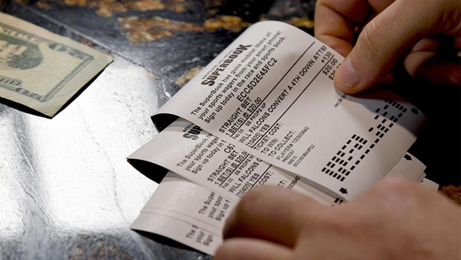 A bettor places wagers on some of the more than 400 proposition bets on the Super Bowl
