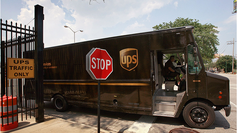  A truck departs a United Parcel Service Inc. (UPS) terminal