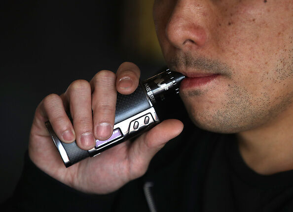 Vaping e-cigarettes  Getty Images