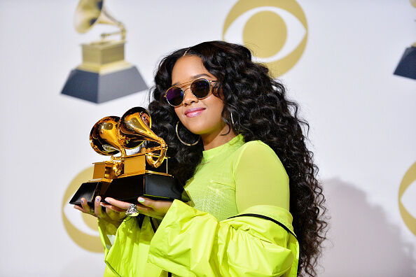 New girl H.E.R. picked up a pair of statues at Grammy 2019
