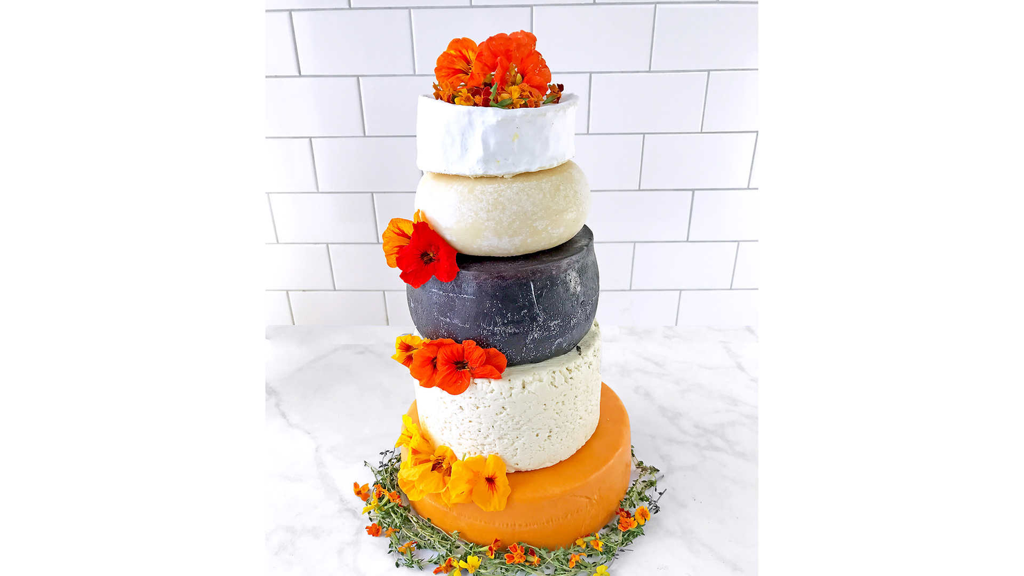 costco selling 24-pound "wedding cake" made out of five different cheeses