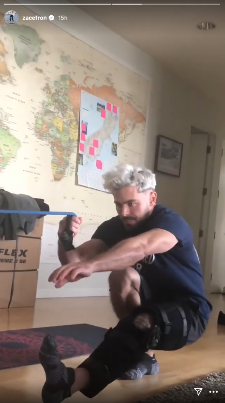 Zac Efron Celebrates PostKnee Surgery Recovery With New Haircut