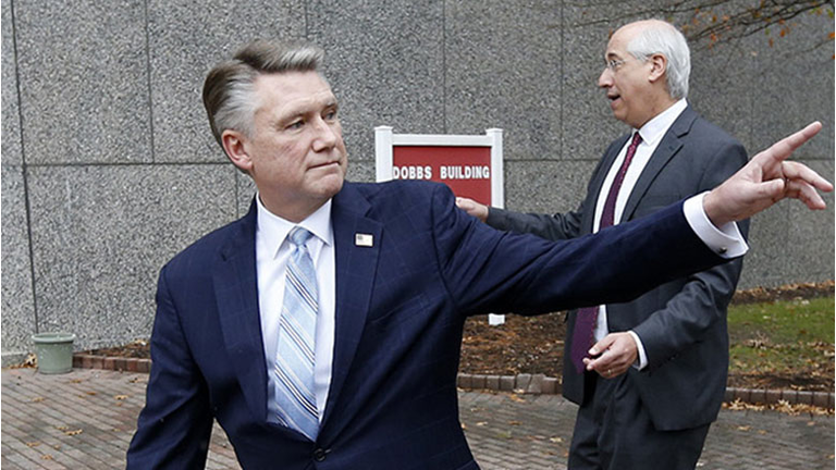 Republican Mark Harris, left, and his attorney David Freedman leave after speaking with the media following a meeting with state election investigators 