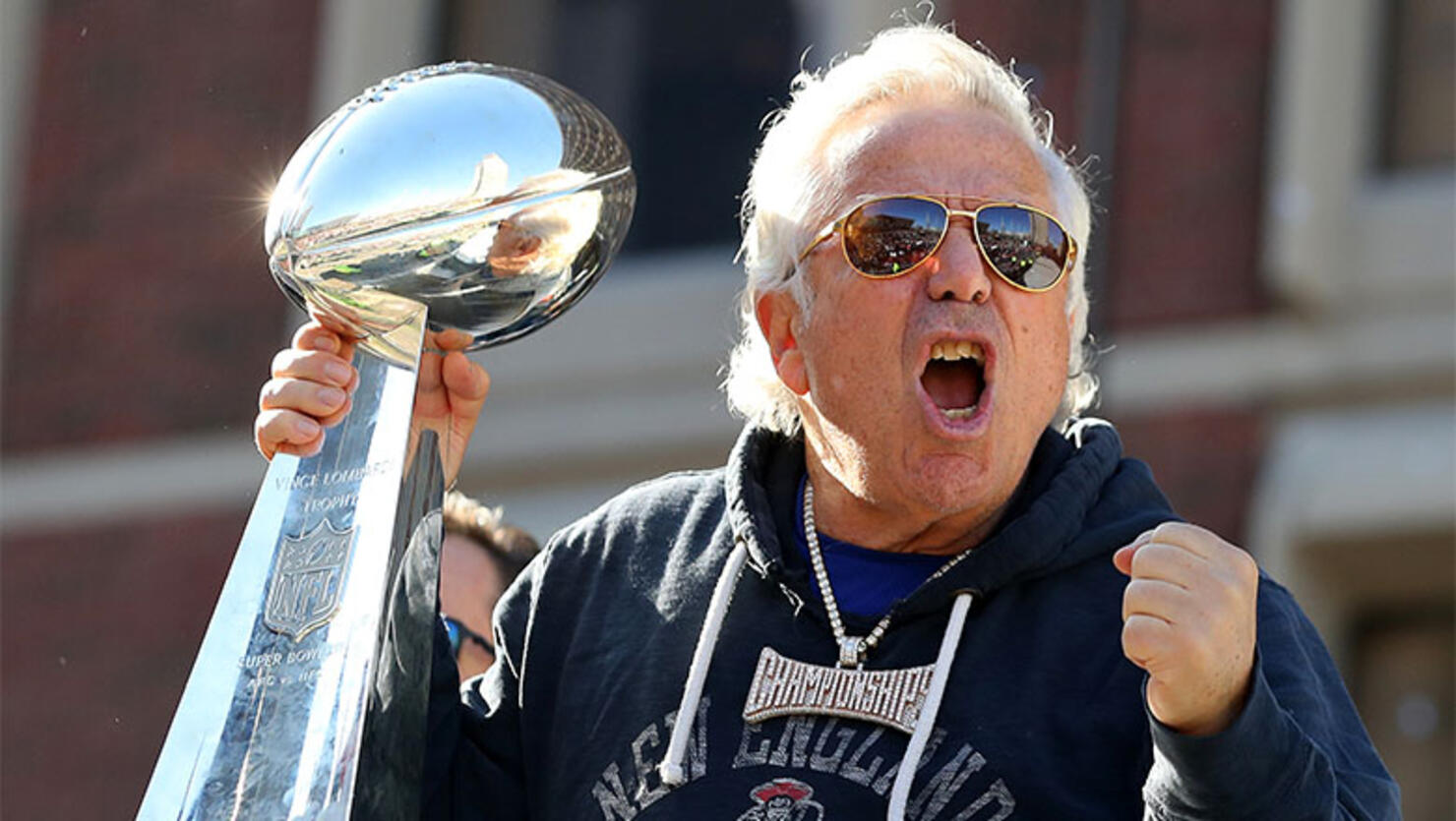  Patriots ownder Robert Kraft celebrates on Cambridge street during the New England Patriots Victory Parade