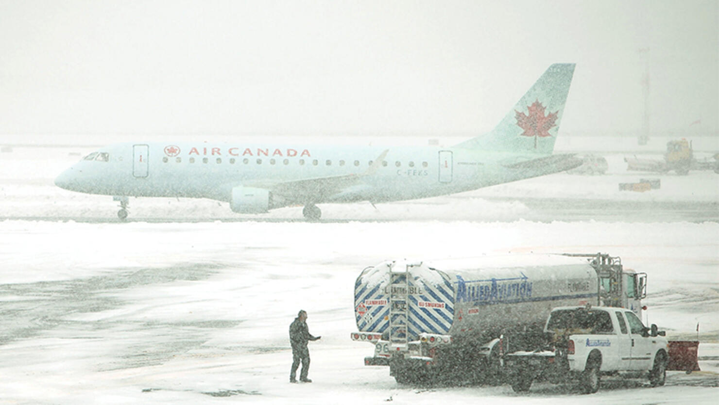 An Air Canada plane is viewed on the tarmac