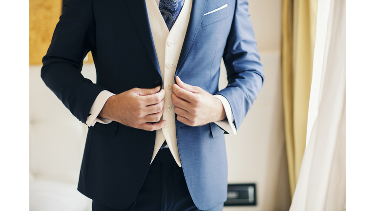 Close-up of a man wearing a smart suit