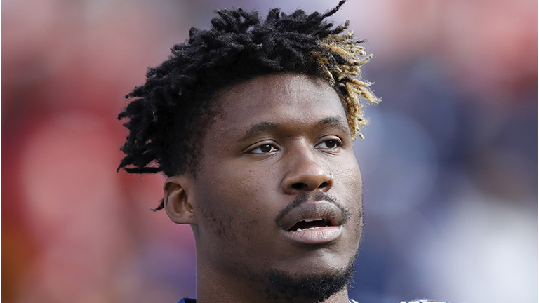 David Irving #95 of the Dallas Cowboys looks on during the game against the Washington Redskins at FedExField