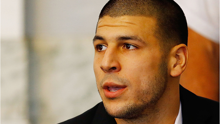 Aaron Hernandez sits in the courtroom of the Attleboro District Court