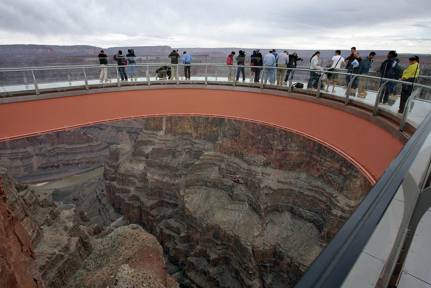 Visitors walk on the Skywalk at Grand Ca