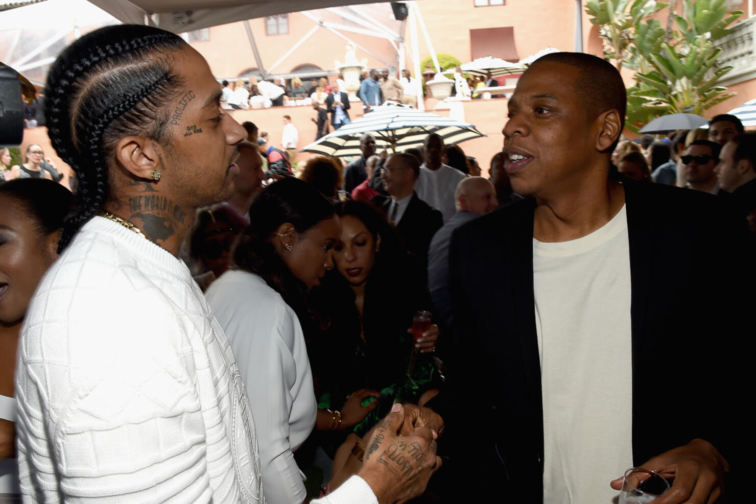 Denzel Washington and Nipsey Hussle at a basketball game between the  Houston Rockets and the Los Angeles Lakers at Staples Center in Los…